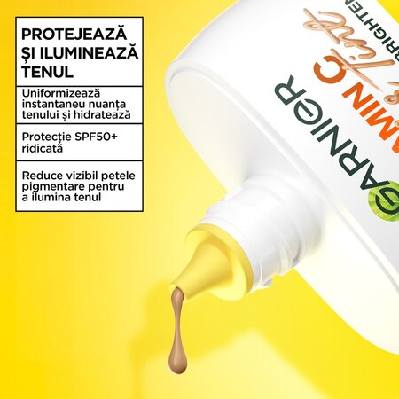 Fluid nuantator cu protectie solara SPF 50+ Nuanta Medie Vitamin C Wonder Tint, 40 ml, Garnier 715751