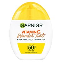 Fluid nuantator cu protectie solara SPF 50+ Nuanta Medie Vitamin C Wonder Tint, 40 ml, Garnier